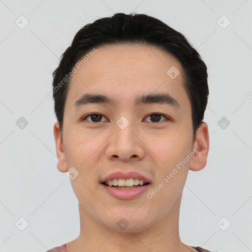 Joyful asian young-adult male with short  black hair and brown eyes