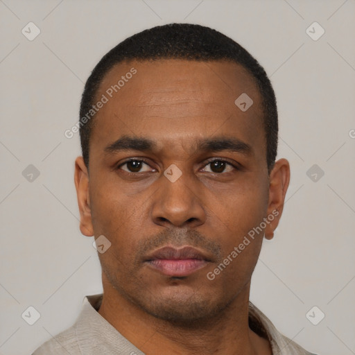 Neutral black young-adult male with short  black hair and brown eyes