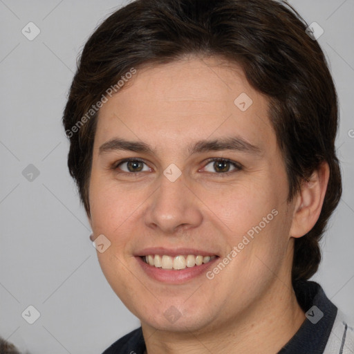 Joyful white young-adult male with medium  brown hair and brown eyes