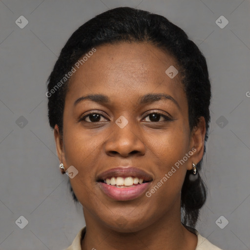 Joyful black young-adult female with medium  black hair and brown eyes