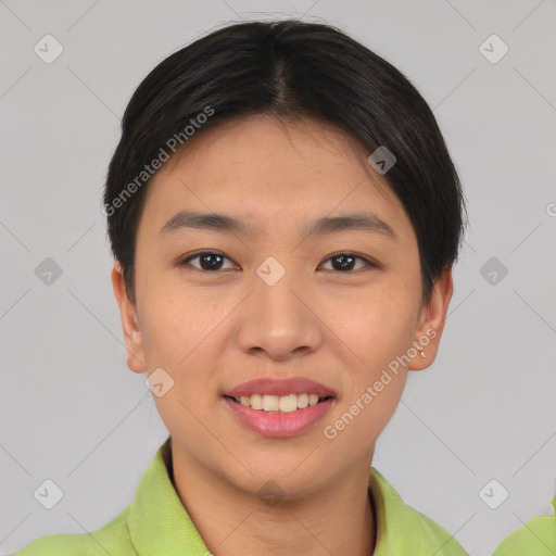 Joyful asian young-adult female with short  black hair and brown eyes