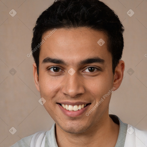 Joyful latino young-adult male with short  black hair and brown eyes