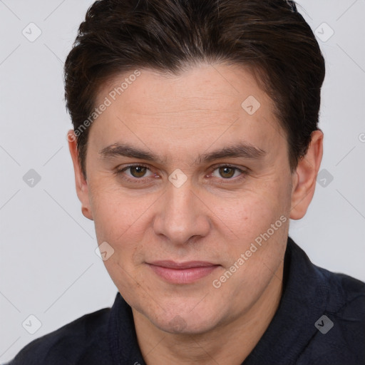 Joyful white adult male with short  brown hair and brown eyes