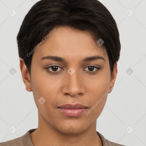 Joyful latino young-adult female with short  brown hair and brown eyes