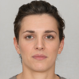 Neutral white young-adult female with short  brown hair and brown eyes