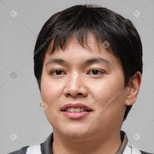 Joyful asian young-adult female with short  brown hair and brown eyes