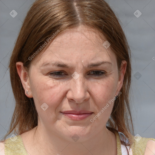 Joyful white adult female with medium  brown hair and grey eyes