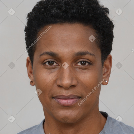 Joyful black young-adult male with short  black hair and brown eyes