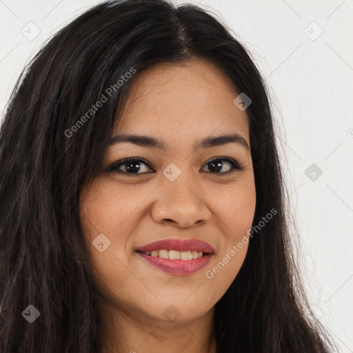 Joyful asian young-adult female with long  brown hair and brown eyes