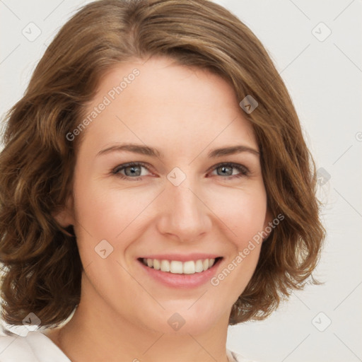 Joyful white young-adult female with medium  brown hair and green eyes