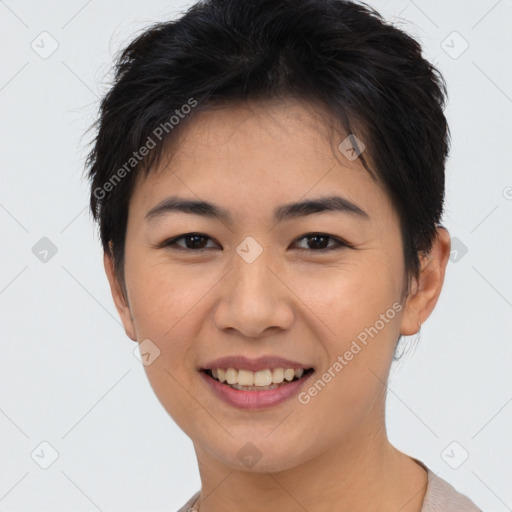 Joyful asian young-adult female with short  brown hair and brown eyes