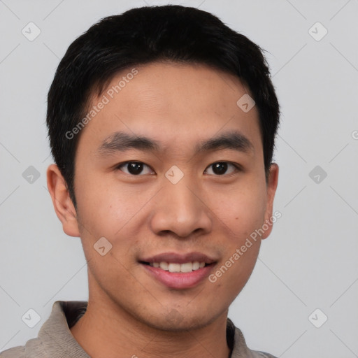 Joyful asian young-adult male with short  black hair and brown eyes