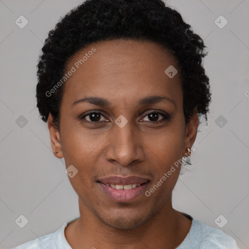 Joyful black young-adult female with short  black hair and brown eyes