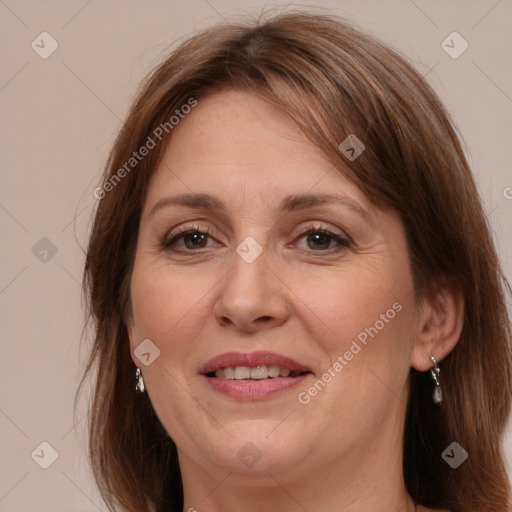 Joyful white adult female with medium  brown hair and grey eyes