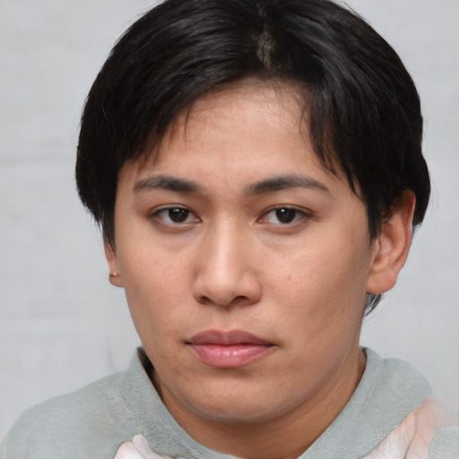 Neutral asian young-adult female with short  brown hair and brown eyes