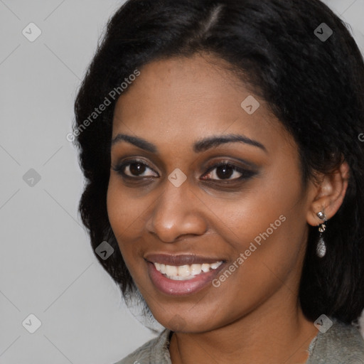 Joyful black young-adult female with medium  black hair and brown eyes