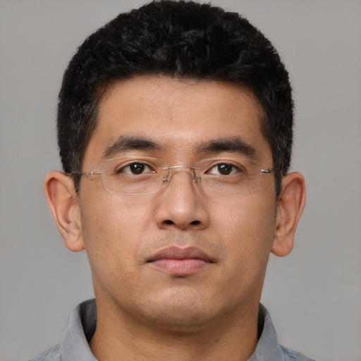 Neutral asian young-adult male with short  brown hair and brown eyes