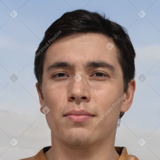 Neutral asian young-adult male with short  brown hair and brown eyes