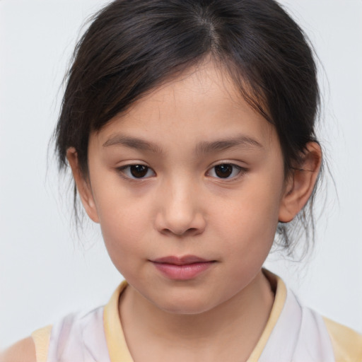 Joyful white child female with medium  brown hair and brown eyes