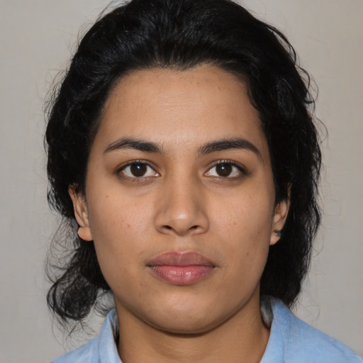 Neutral latino young-adult female with medium  black hair and brown eyes