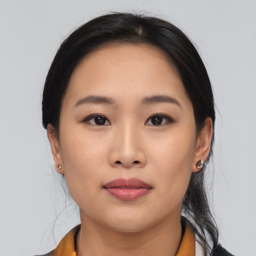 Neutral asian young-adult female with medium  black hair and brown eyes