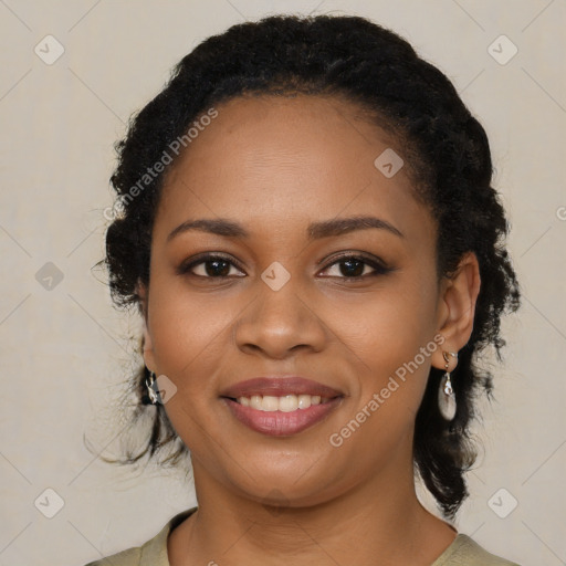 Joyful black young-adult female with medium  black hair and brown eyes