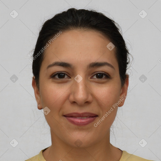 Joyful latino young-adult female with short  brown hair and brown eyes