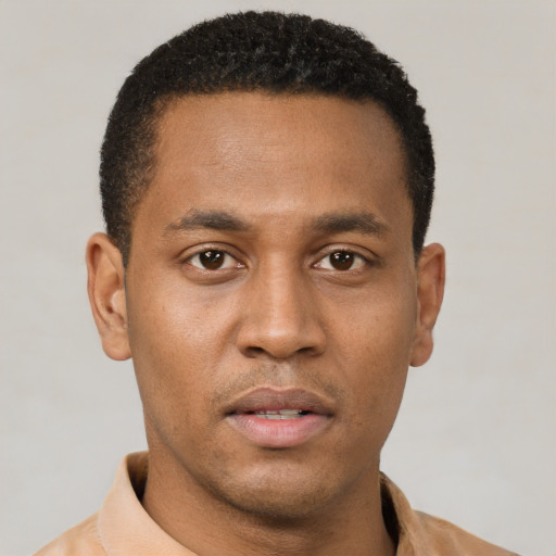 Neutral latino young-adult male with short  brown hair and brown eyes