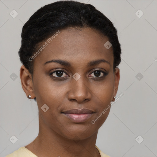 Joyful black young-adult female with short  brown hair and brown eyes