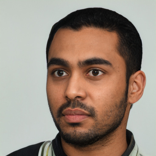 Neutral latino young-adult male with short  black hair and brown eyes