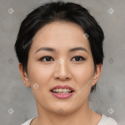 Joyful asian young-adult female with medium  black hair and brown eyes