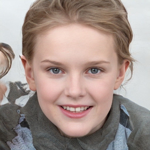 Joyful white child female with medium  brown hair and blue eyes