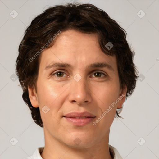 Joyful white adult female with short  brown hair and brown eyes