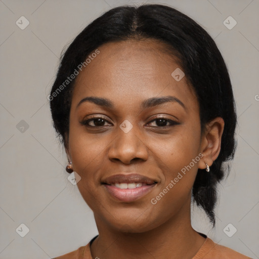 Joyful black young-adult female with medium  black hair and brown eyes