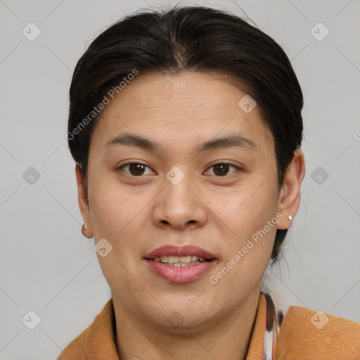 Joyful asian young-adult female with short  brown hair and brown eyes