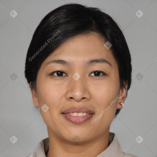 Joyful asian young-adult female with short  brown hair and brown eyes