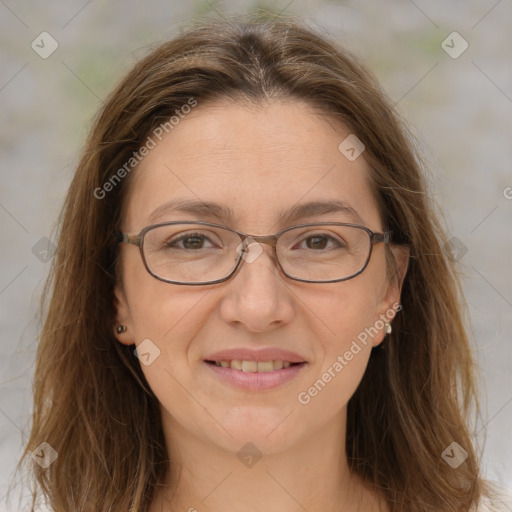 Joyful white adult female with medium  brown hair and brown eyes