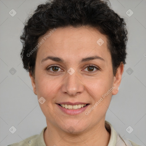 Joyful white adult female with short  brown hair and brown eyes