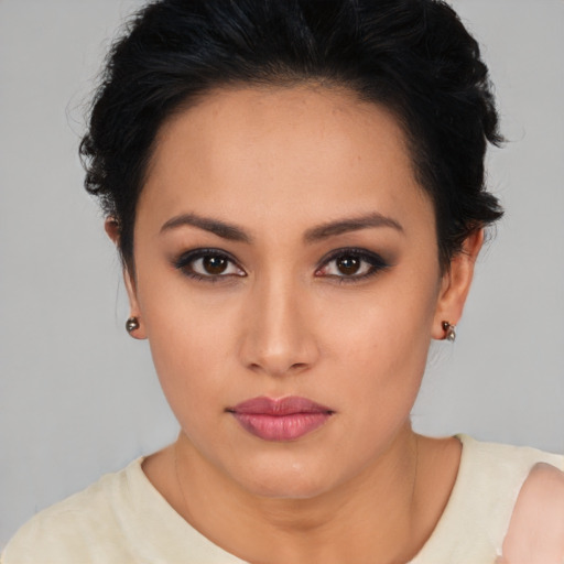 Neutral latino young-adult female with medium  black hair and brown eyes