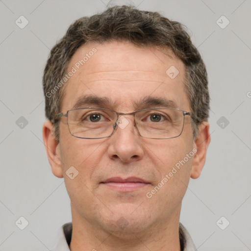 Joyful white middle-aged male with short  brown hair and brown eyes