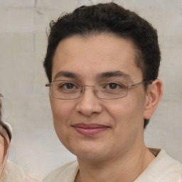 Joyful white adult female with short  brown hair and brown eyes