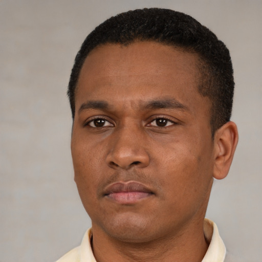 Neutral black young-adult male with short  black hair and brown eyes
