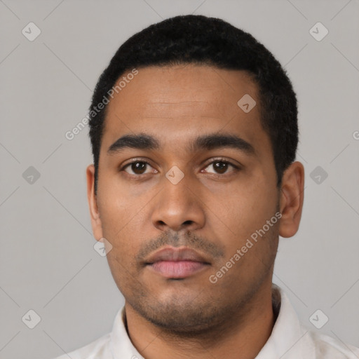 Neutral latino young-adult male with short  black hair and brown eyes