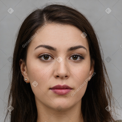 Neutral white young-adult female with long  brown hair and brown eyes