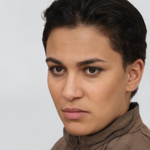 Neutral white young-adult female with short  brown hair and brown eyes
