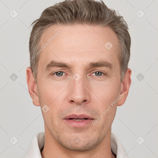 Neutral white adult male with short  brown hair and grey eyes