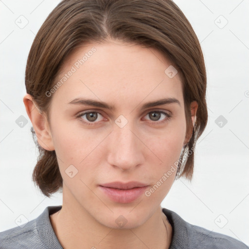 Neutral white young-adult female with medium  brown hair and grey eyes