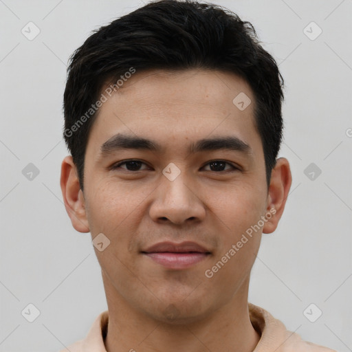 Joyful asian young-adult male with short  black hair and brown eyes