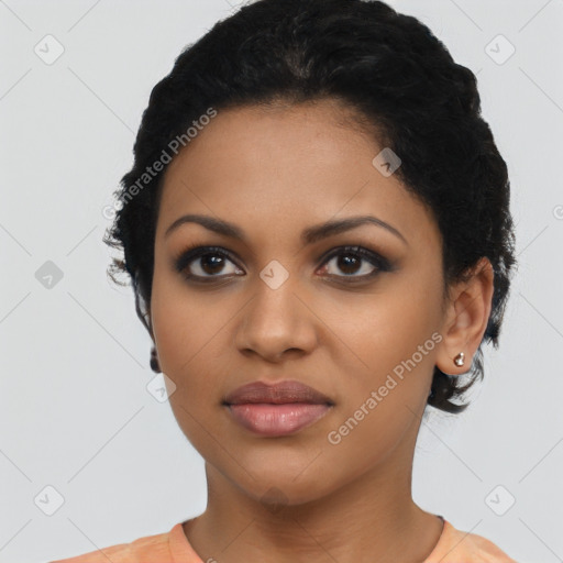 Joyful latino young-adult female with short  black hair and brown eyes