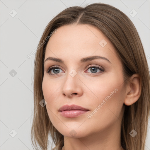 Neutral white young-adult female with long  brown hair and brown eyes